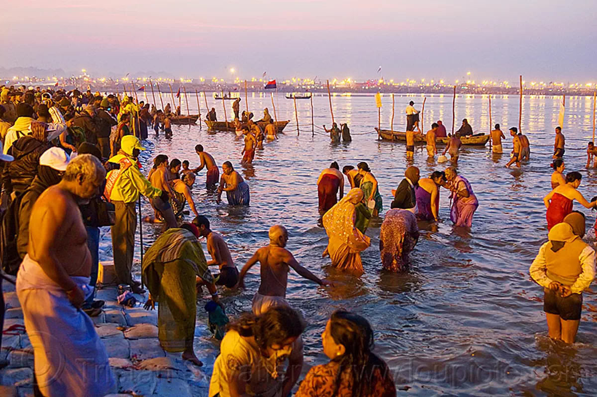 Hindu Pilgrims Bathing In The Ganges River At Sangam Kumbh Mela 2013