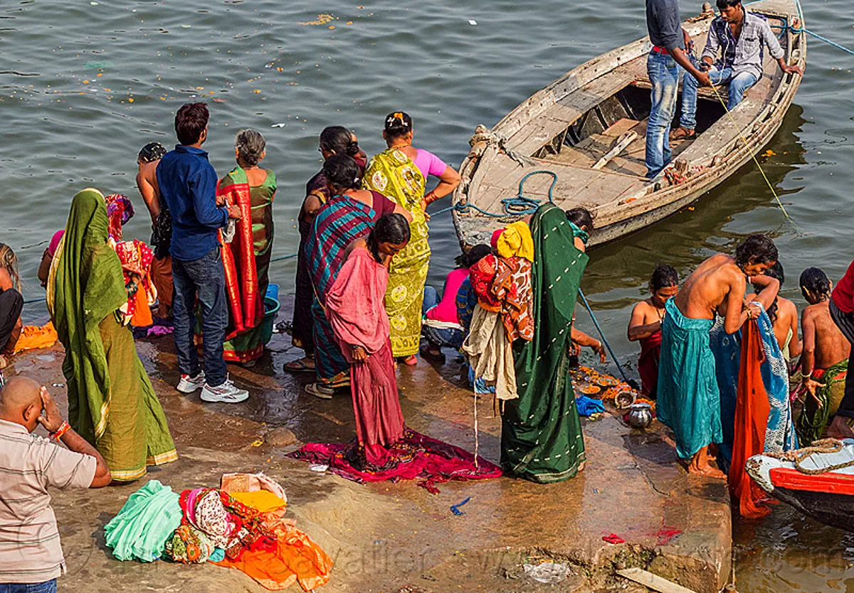 Hindu Women Bathing In The Ganges River In Varanasi India