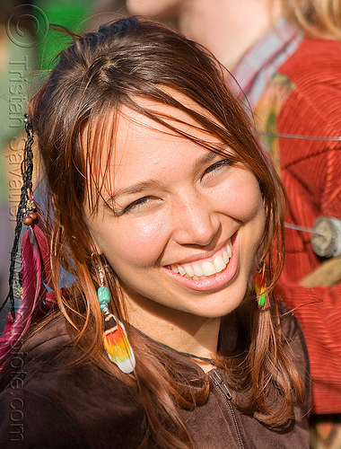 hippie girl with feathers feather earrings feather hair extensions 