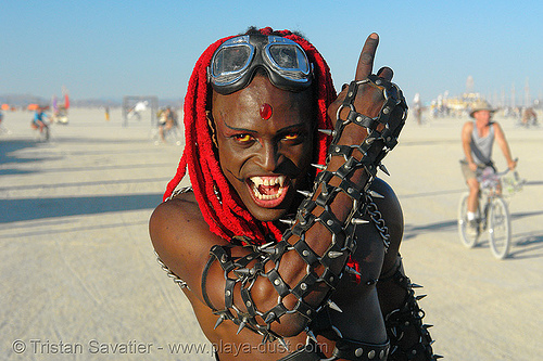 black vampire, african american man, arm, bicolor contact lenses, bindis, black man, color contact lenses, contacts, dreadlocks, goggles, leather, red hair, special effects contact lenses, theatrical contact lenses, vampire fangs