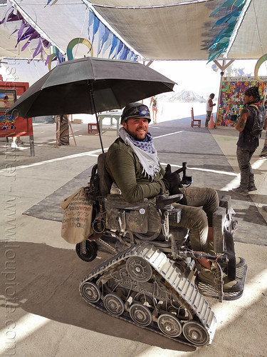 burner in tracked wheelchair- burning man 2019, man, paralyzed, paraplegic, soldier, tracked wheelchair, umbrella