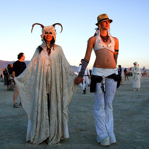 burning man - stardust at the silent white procession at dawn, dawn, fedora hat, gangster hat, stardust, white morning, women