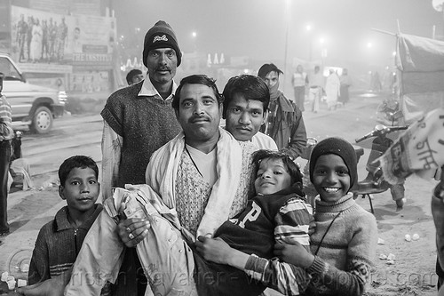father and his children at kumbh mela 2013 (india), boys, children, family, group, hindu pilgrimage, hinduism, kids, kumbh mela, men, night, pilgrims
