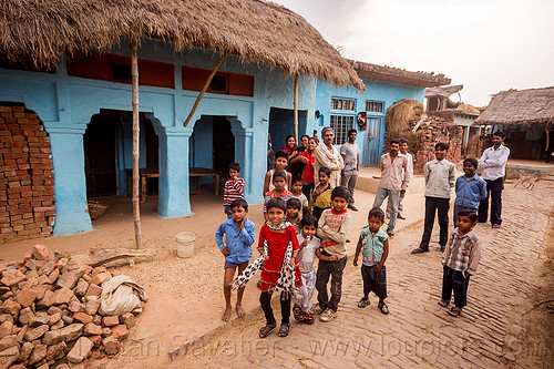 group of kids and men in indian village, blicks, blue house, children, crowd, khoaja phool, kids, men, village, खोअजा फूल