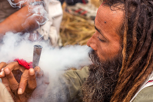 hindu baba smoking chillum of weed (cannabis), baba smoking chillum, beard, blowing, chillum pipe, dreadlocks, ganja, hindu pilgrimage, hinduism, kumbh mela, man, sadhu, smoking pipe, smoking weed, thick smoke