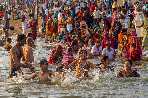 hindu pilgrims taking holy dip in ganges river (india), bathing pilgrims, crowd, ganga, ganges river, hindu pilgrimage, hinduism, holy bath, holy dip, kumbh mela, nadi bath, river bank, river bathing, splash, splashing, triveni sangam