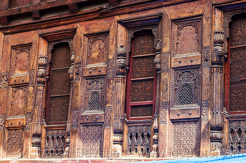 house facade with intricate wood carvings in almora (india), almora, carved, facade, house, intricate, low relief, windows, wood carving, wooden
