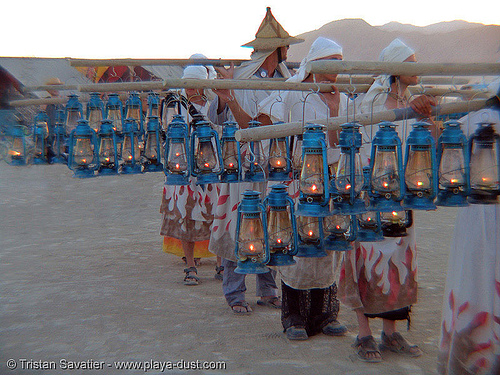 lamplighters - burning man 2005, lamplighters, march, petrol lanterns, poles