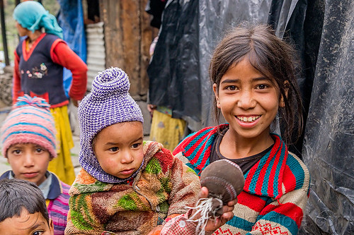 little girl holding baby in himalayan village (india), baby, children, janki chatti, kids, knit cap, little girl, toddler