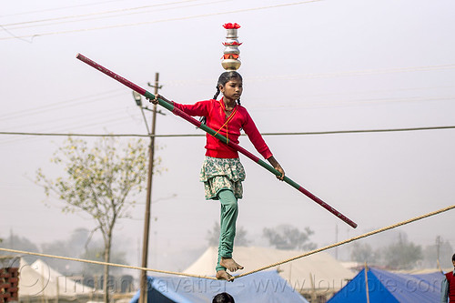 slacklining - slack rope walking - street circus artist (india), acrobat, balancing pole, balancing stick, child, circus act, circus artist, circus performer, equilibrist, hindu pilgrimage, hinduism, kid, kumbh mela, little girl, rope walker, rope walking, slack rope, slacklining, traveling circus