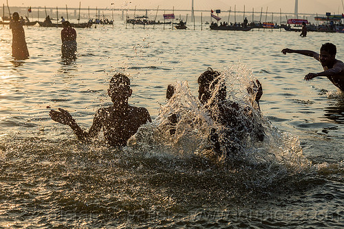 Splashing Water Hindu Devotees Taking Holy Dip In Ganges River India