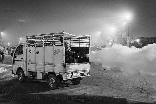 truck spraying ddt at kumbh mela 2013 (india), air quality, ddt, environment, fog gun, fog truck, fogger truck, fogging, hindu pilgrimage, hinduism, insecticide, kumbh mela, lorry, night, pollution, smog, spray, spraying, white smoke