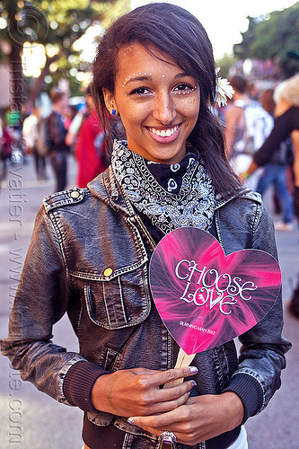 young woman holding "choose love" sign - burning man decompression, black bandana, black bandanna, tenisha, woman