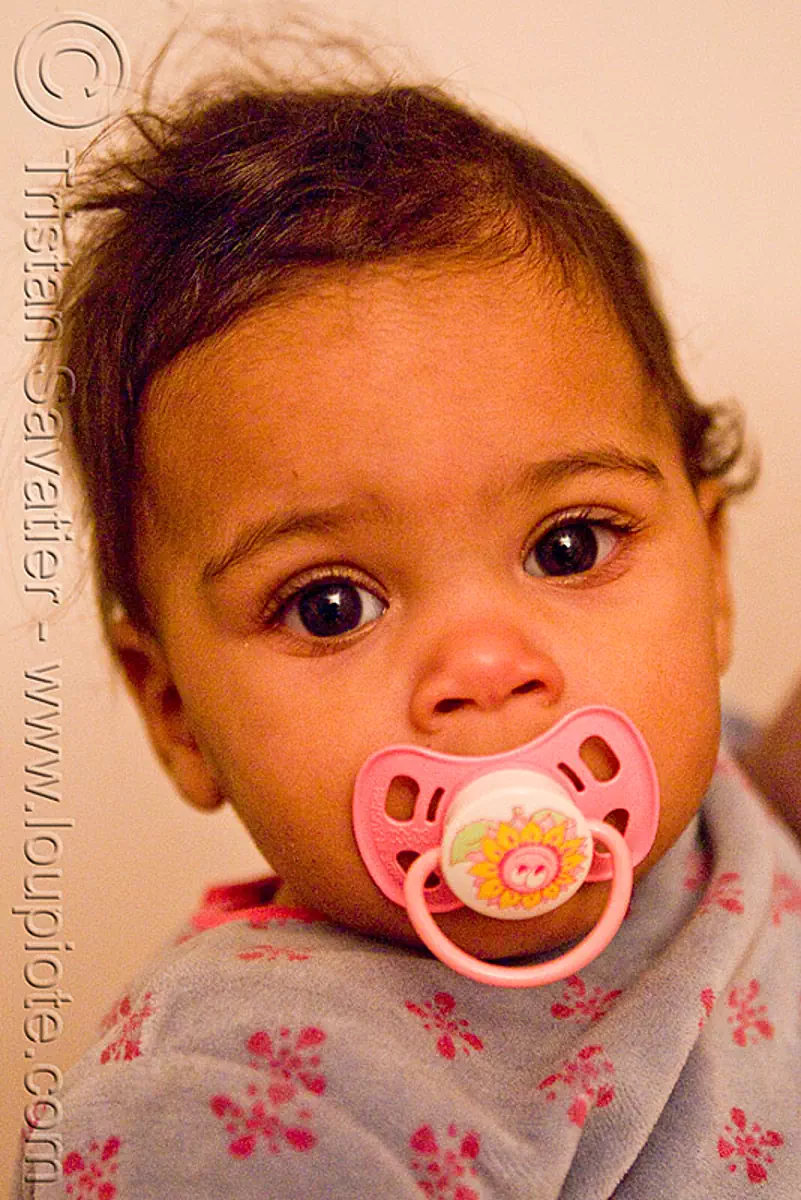 baby with pacifier, mia