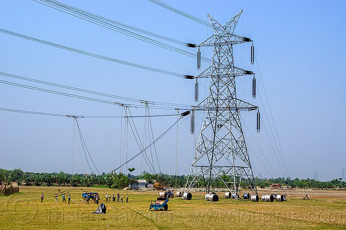 cable riggers installing power lines on transmission tower india cable riggers installing power lines on transmission tower india posters wall art stock photos royalty free images