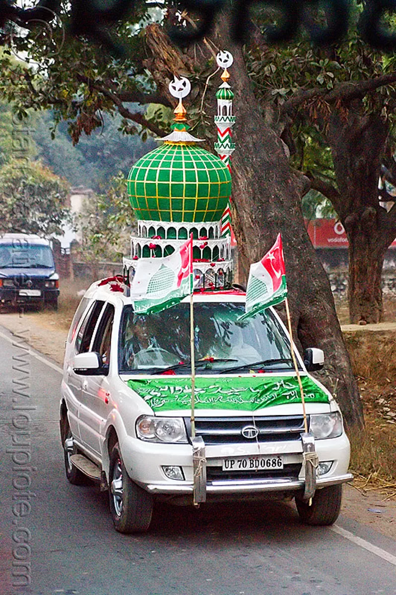 car decorated with a mosque dome and minaret on its roof, eid-milad-un