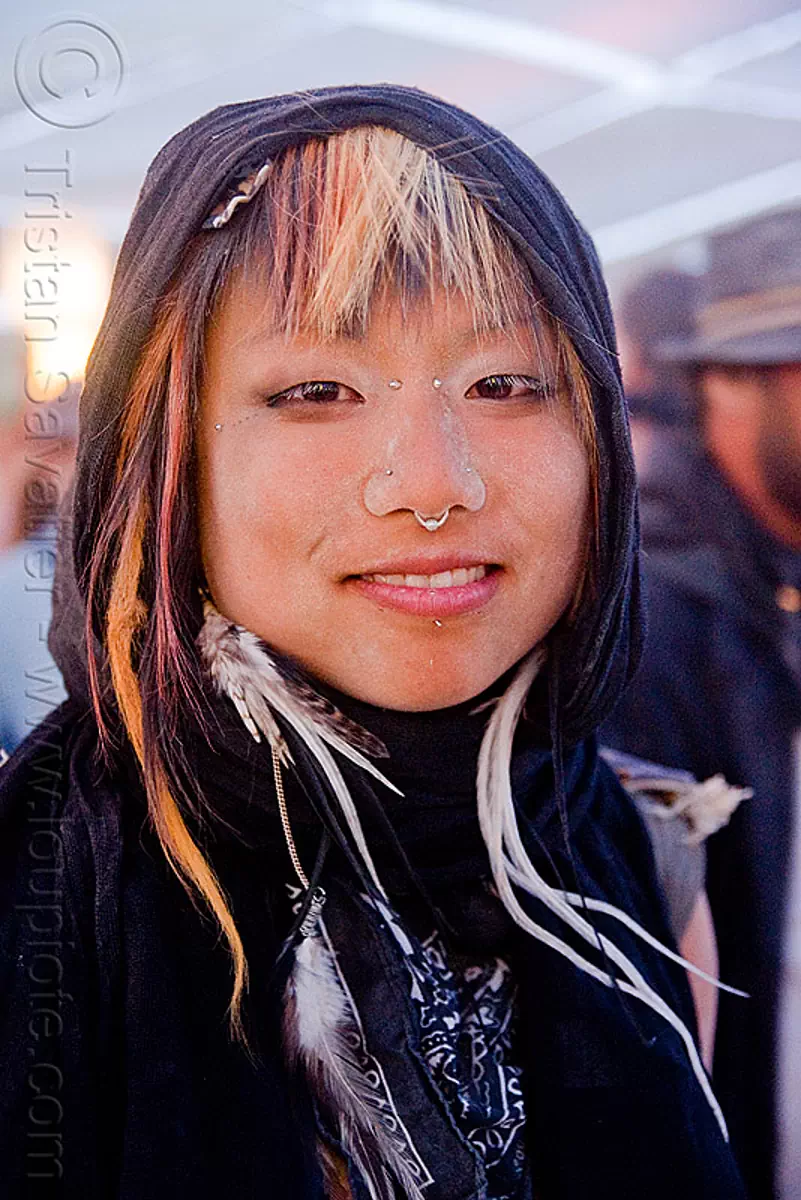 dusty asian woman at center camp cafe, burning man 2009