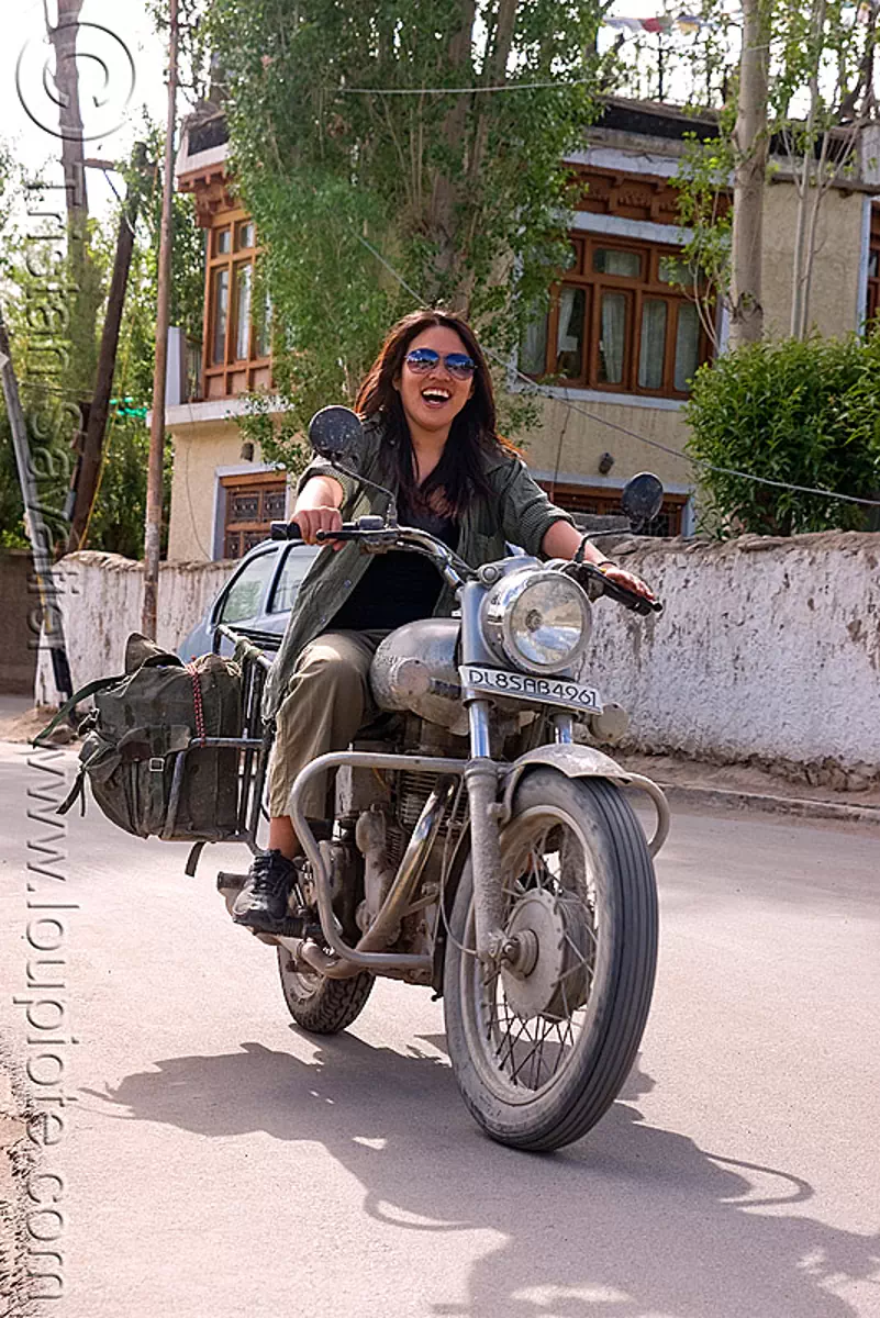 girl riding royal enfield