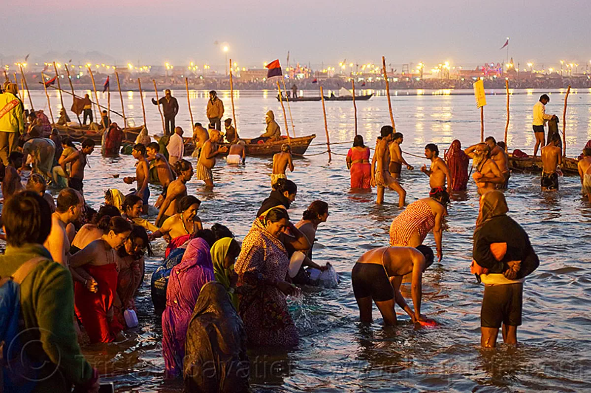 Hindu Pilgrims Bathing In The Ganges River At Sangam Kumbh Mela 2013 India