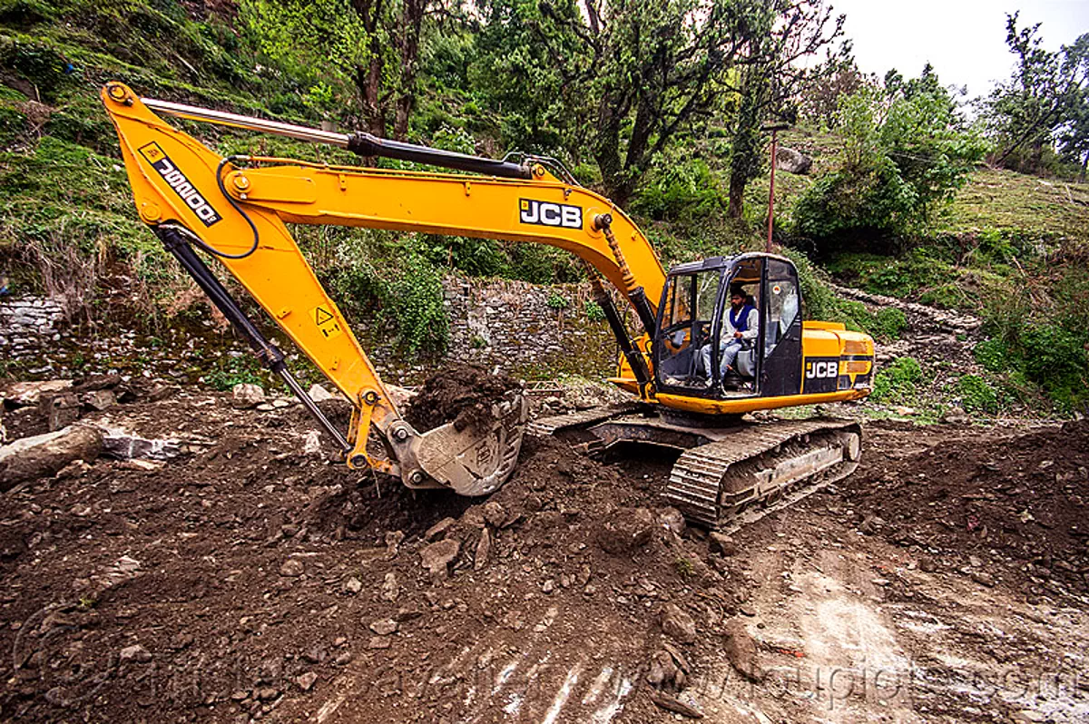 JCB Excavator Clearing A Landslide, India