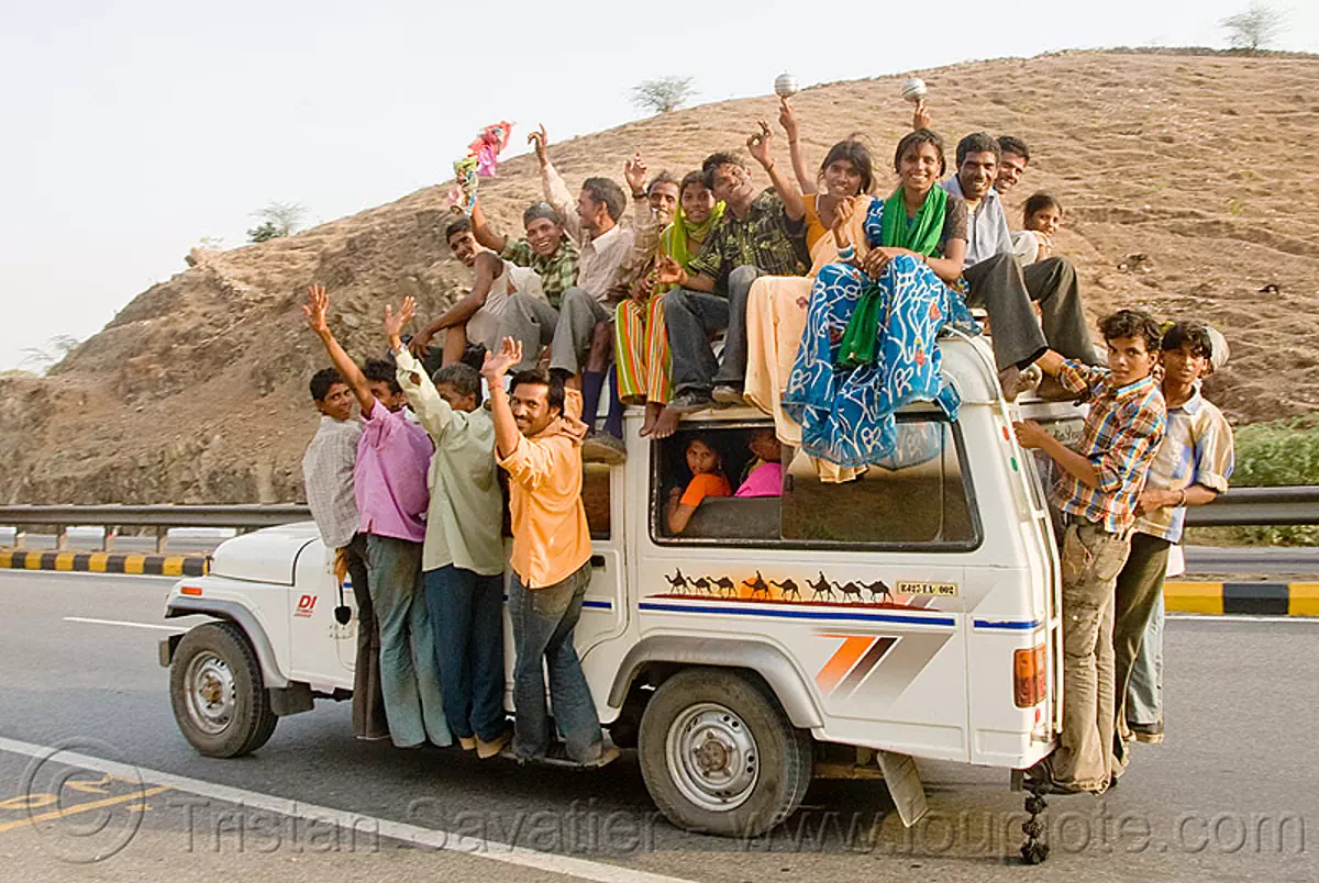overloaded-car-wedding-party-on-mahindra-taxi-jeep-india-3710406937.jpg