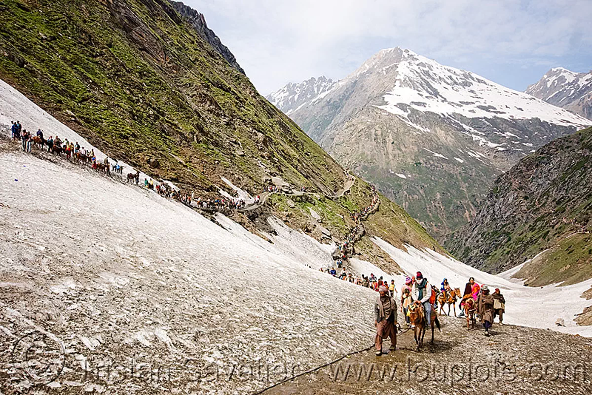 pilgrims on glacier trail, amarnath yatra (pilgrimage), kashmir