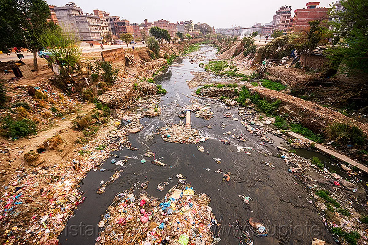 plastic trash pollution in the bishnumati river in kathmandu, nepal