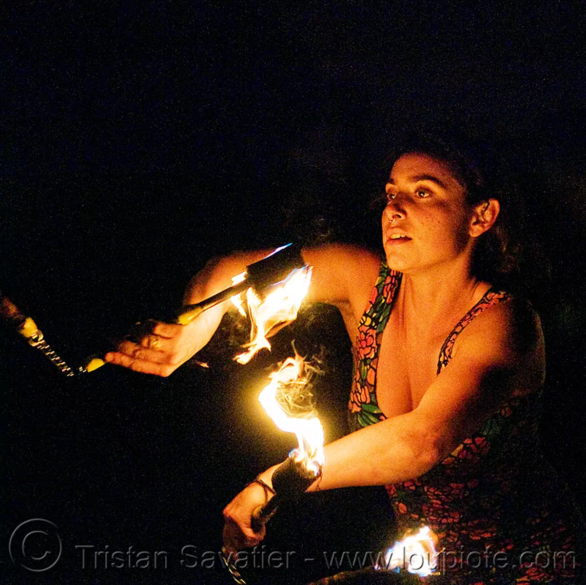 sarah with fire nunchaku