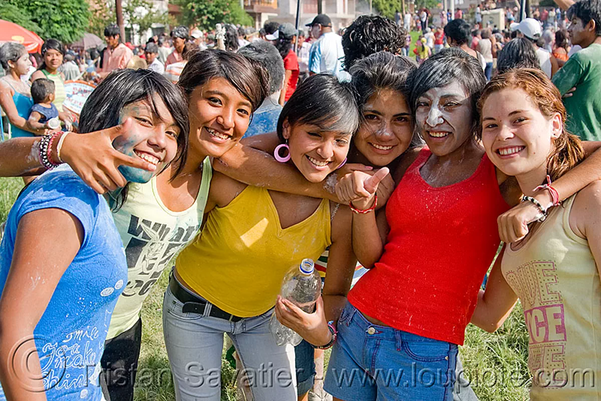 six girls enjoying the carnival in jujuy capital, argentina