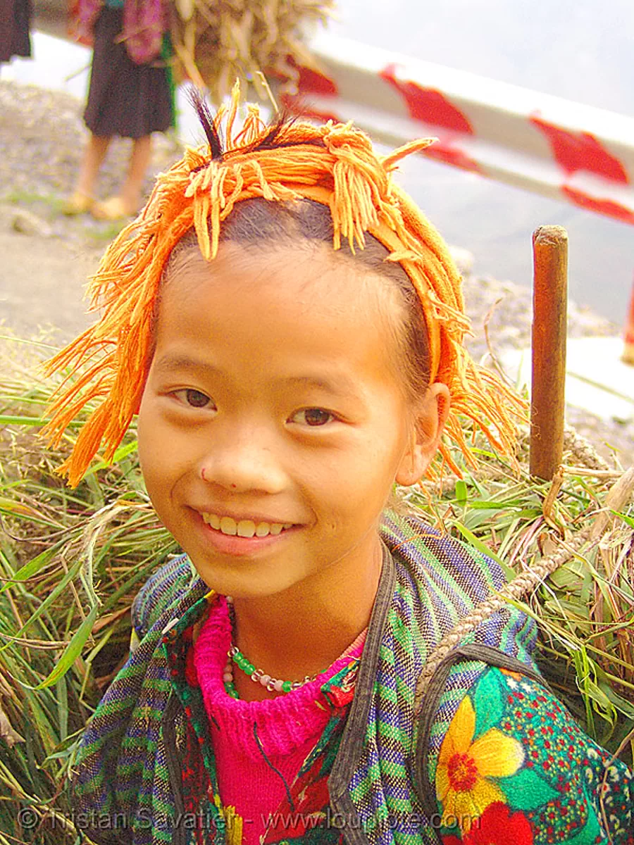 tribe girl carrying grass, vietnam