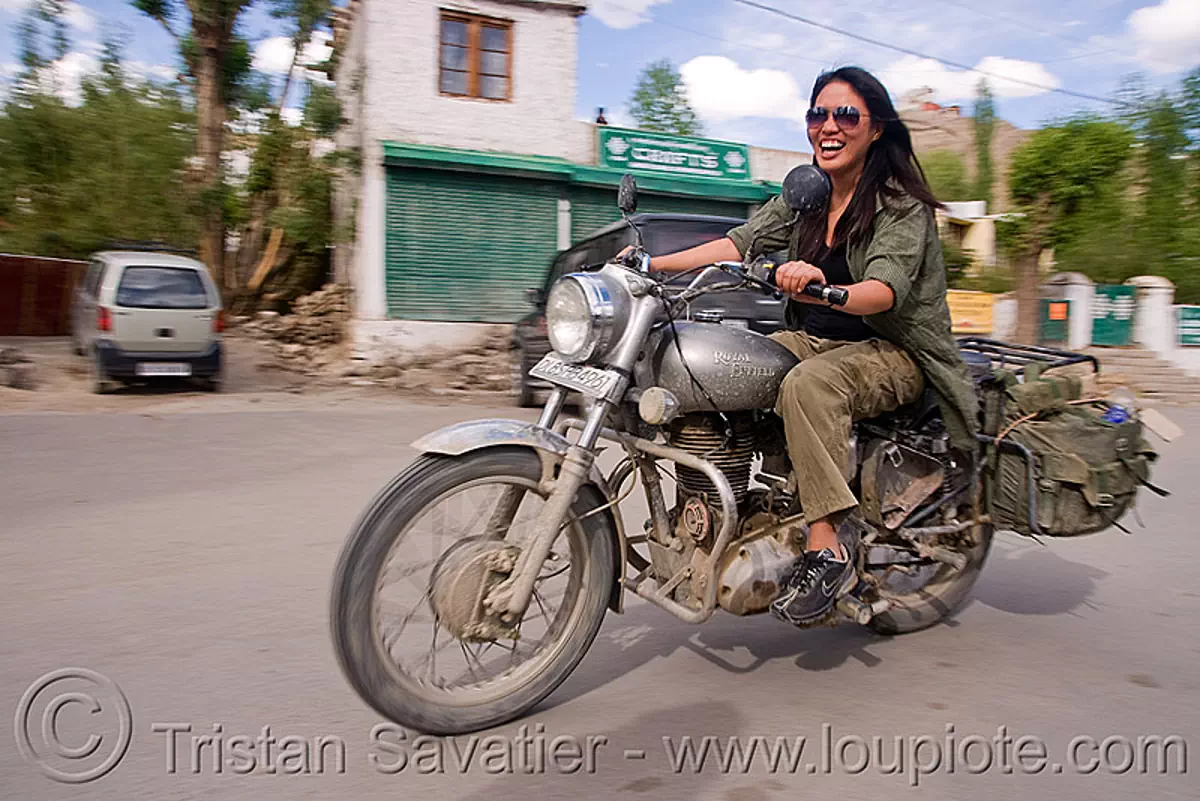 girl riding royal enfield