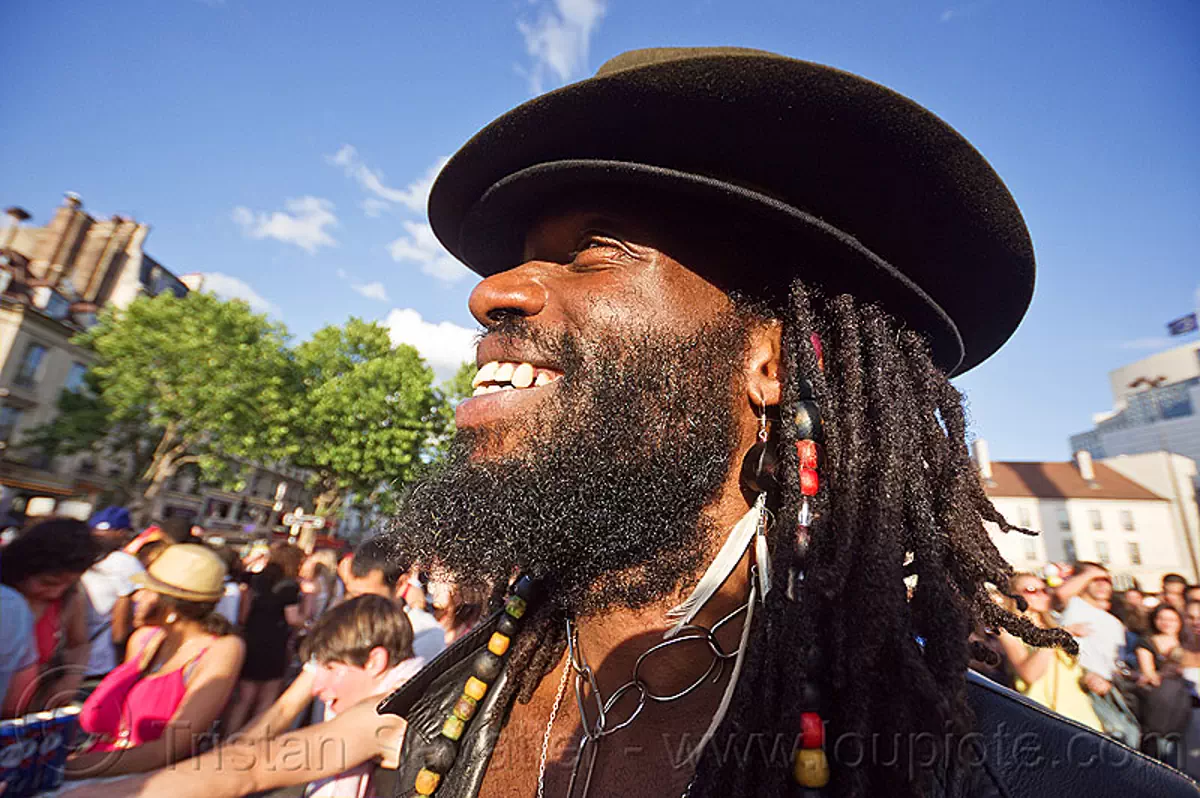 Man with Beard, Dreadlocks and Hat