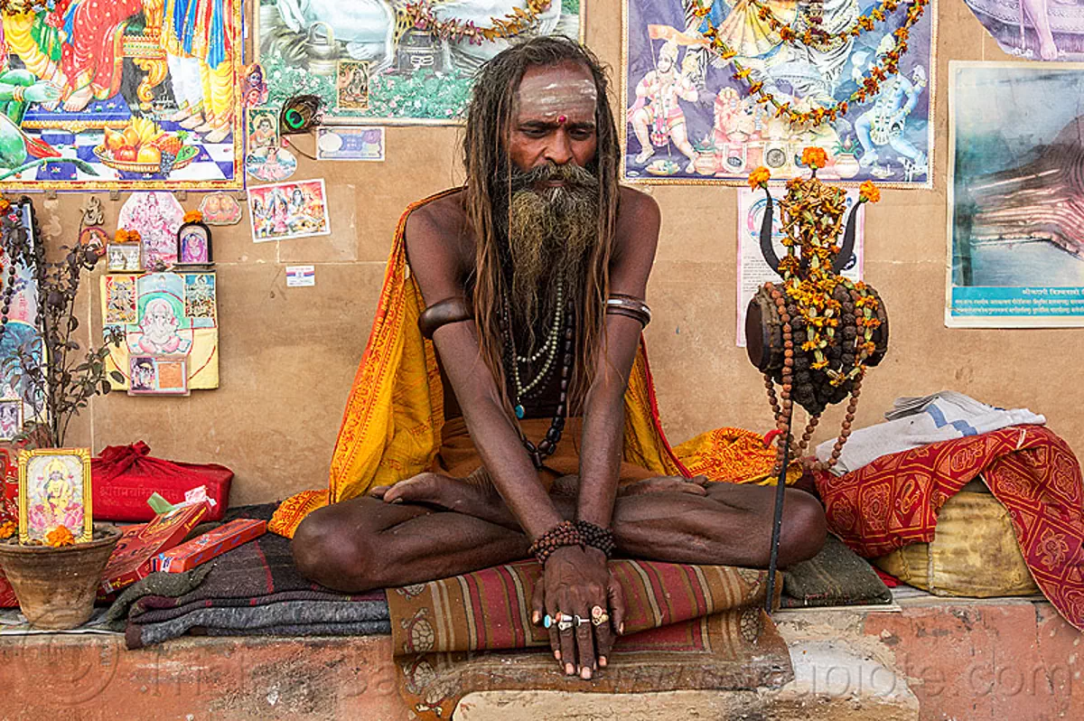 Naked Baba - Naga Sadhu Sitting Crosslegged in Varanasi (India)