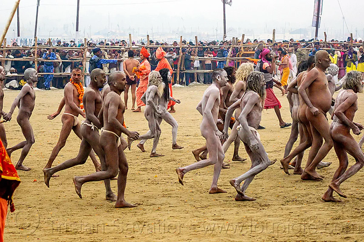 Naked Hindu Devotees Running towards the Ganges River - Kumbh Mela (India)