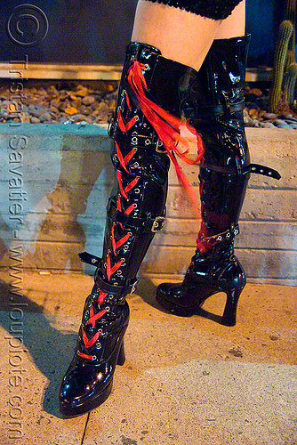 high heel boots with red laces