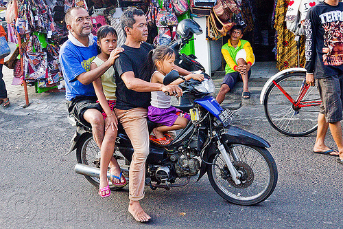 five on a motorbike, indonesia