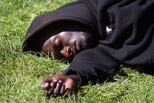 black man sleeping on grass, african american man, black man, grass, hand, hood, hooded, lawn, laying down, sleeping