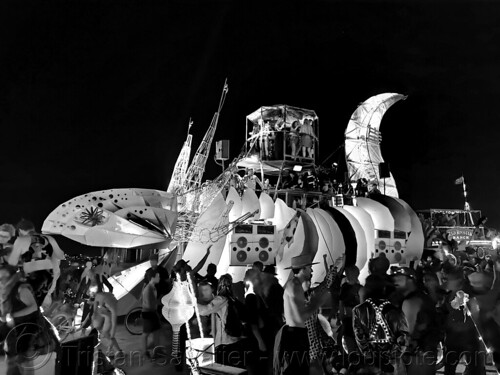 burning man - axolotle art car, axolotle art car, burning man art cars, burning man at night, glowing, mutant vehicles