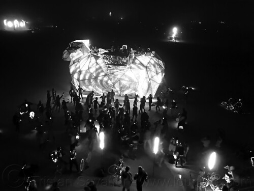 burning man - baaahs art car - sheep art car, art car, baaahs, burning man art cars, burning man at night, crowd, glowing, mutant vehicles