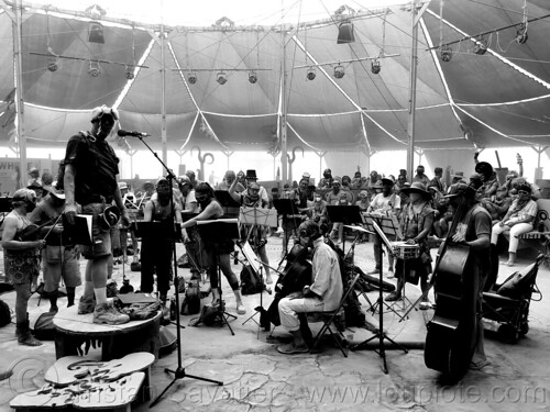 burning man - black rock philharmonic orchestra playing at center camp cafe, black rock philharmonic, crowd, music, orchestra, playing