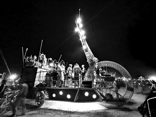 burning man - clock ship tere at night, art car, burning man art cars, burning man at night, c.s. tere, clock ship tere, glowing, mutant vehicles, the lost machine