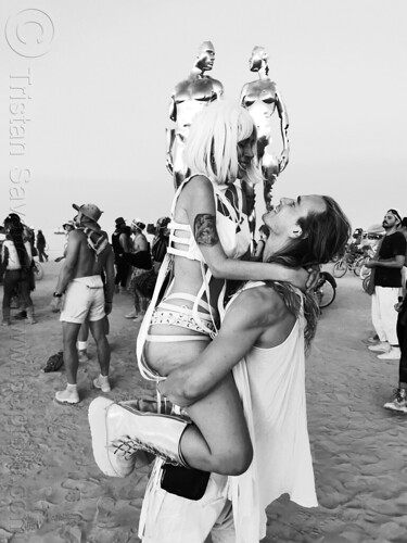 burning man - couple dressed in white, man, woman