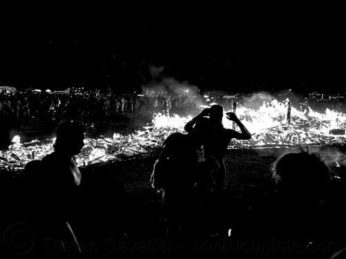 burning man - crowd around the embers of the burnt man, burning man at night, night of the burn