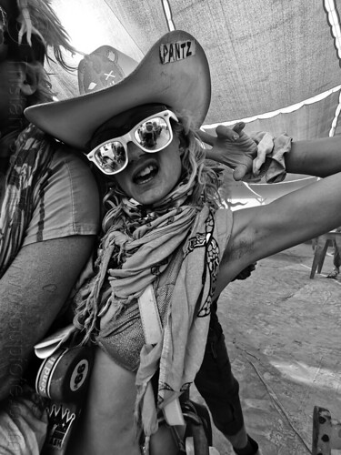 burning man - dusty woman with hat in center camp cafe - pantz, dusty, hat, pantz, sunglasses, woman