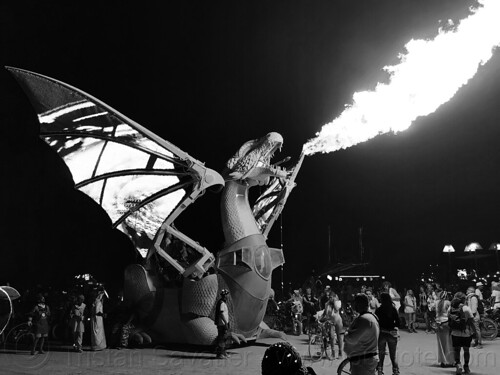 burning man - elektra (glory) dragon art car blowing fire at night, burning man art cars, burning man at night, elektra dragon art car, fire, glory dragon art car, glowing, mutant vehicles