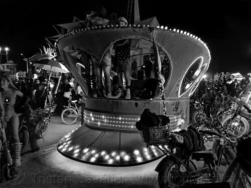 burning man - giant military cap art car, burning man art cars, burning man at night, glowing, mutant vehicles, unidentified art car