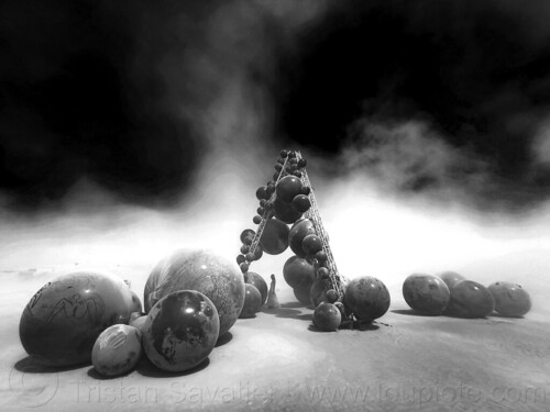 burning man - large black rubber balls - toxic, art installation, black balls, clayton blake, rubber balls, toxic