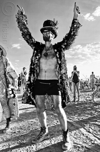 burning man - man with blue fish-scales shiny costume, attire, burning man outfit, hat, jacket, sparkly costumes, sunglasses