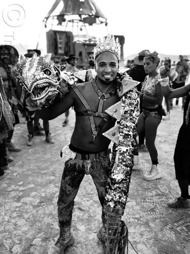 burning man - man with carnival snake puppet, distrikt, man, snake puppet