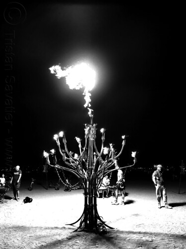 burning man - metal tree blowing fire, art installation, burning man at night, fire